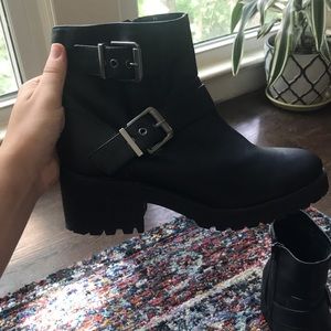 Black boots with silver buckles on the side, size 8 1/2, fits a bit large.